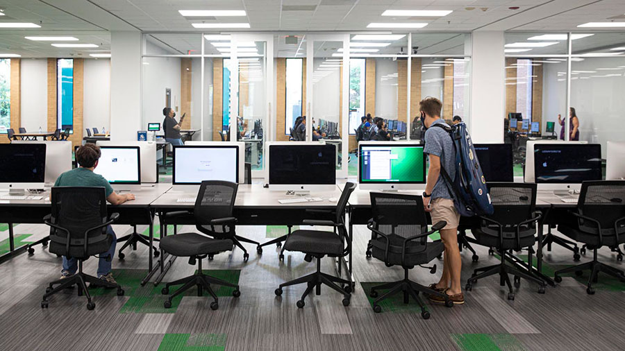 photograph of computers on tables