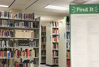 book stacks with book subject pop up floor banner